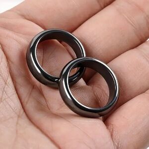 New set of 2- Rings his and hers . Made of natural stone Hematite
